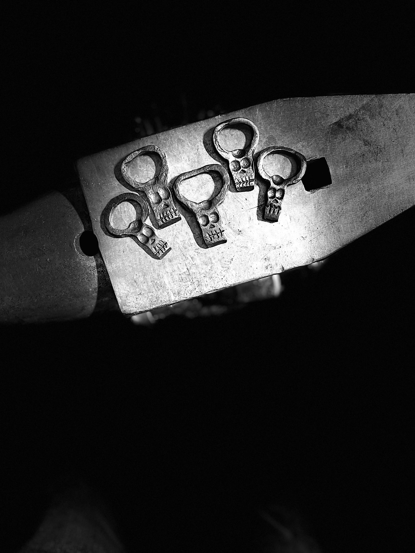 Blacksmith forged skull bottle openers