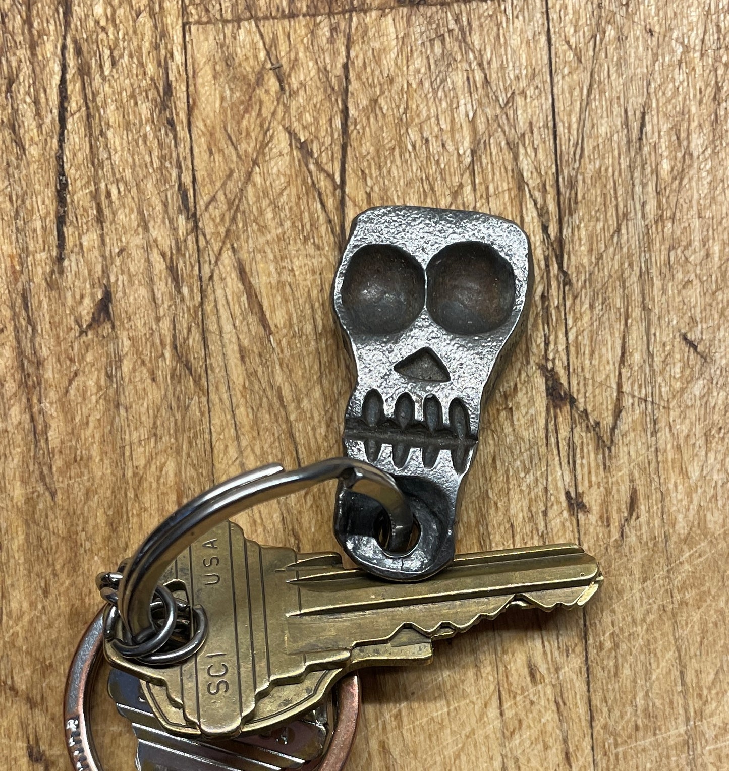 Hand forged skull pendant or key chain fob